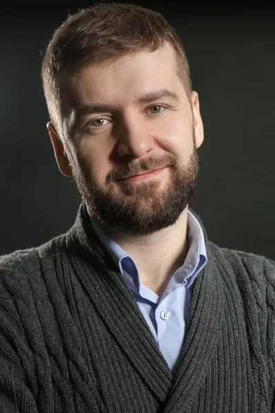 Handsome man on dark background — Stock Photo, Image