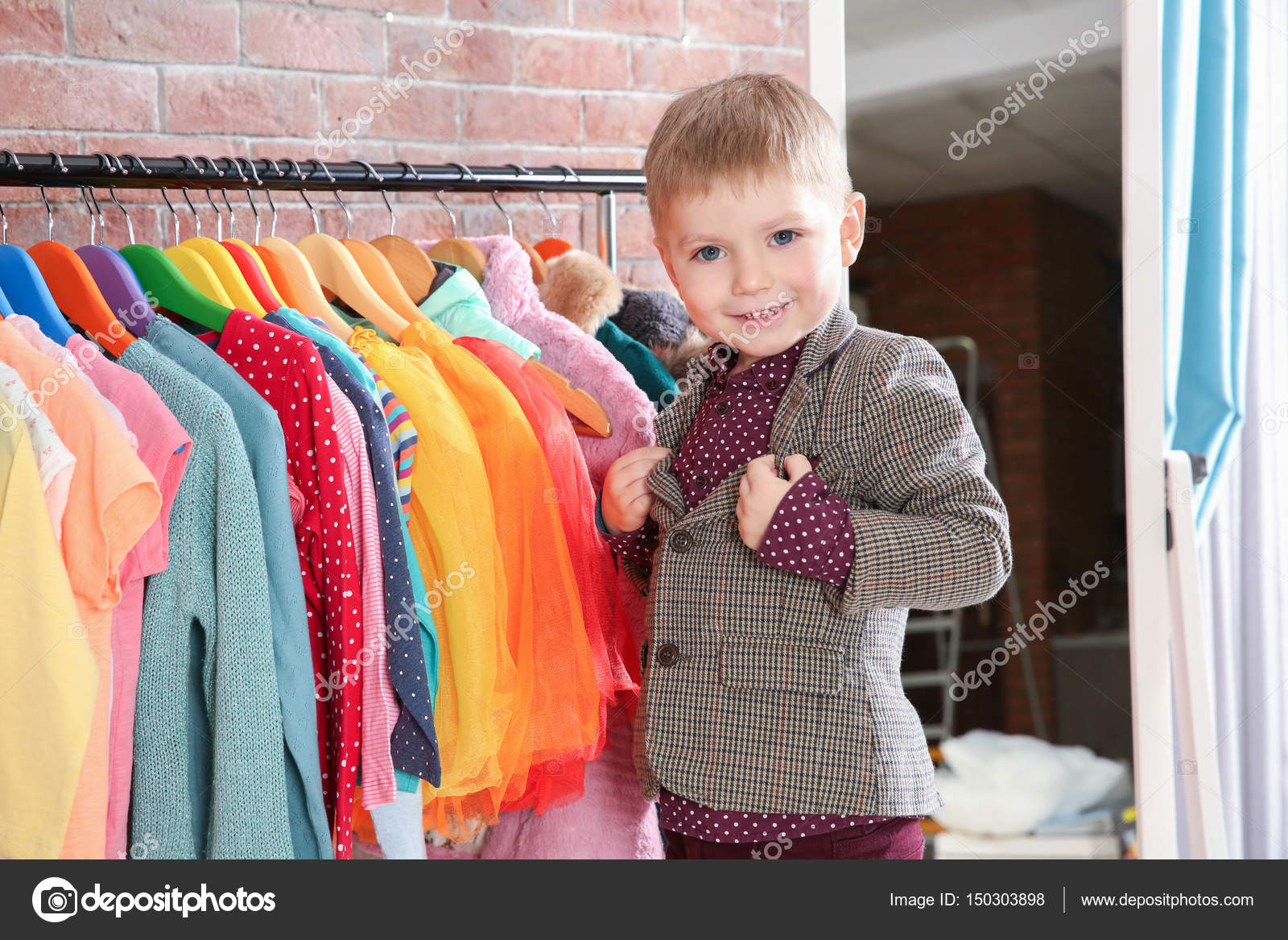Cute boy in dressing room — Stock Photo © belchonock #150303898