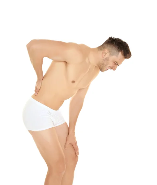 Young man suffering from back pain — Stock Photo, Image