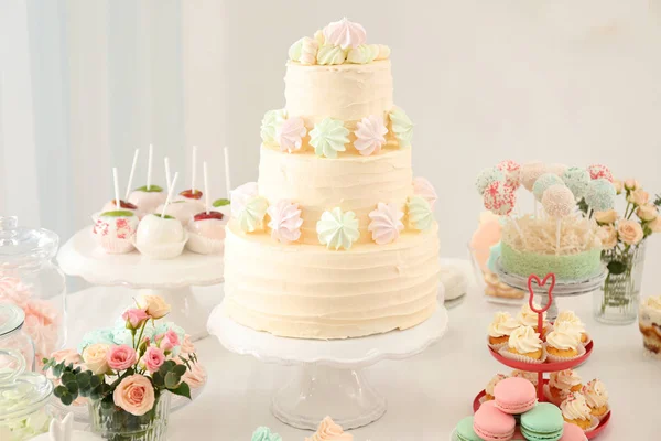 Table with tasty sweets — Stock Photo, Image