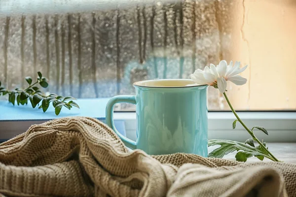 Composition with cup of tea on windowsill — Stock Photo, Image