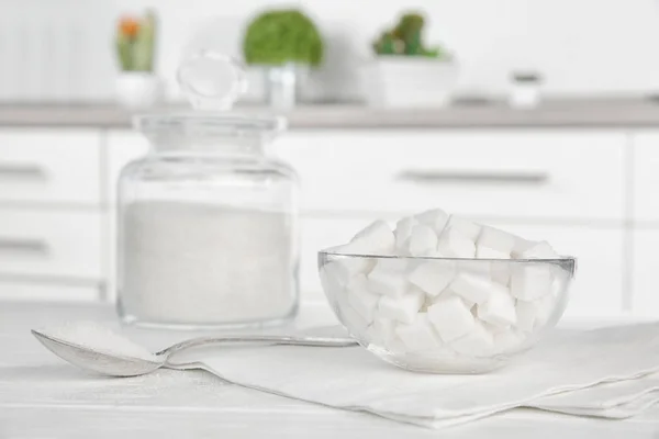 Glass bowl with sugar cubes — Stock Photo, Image