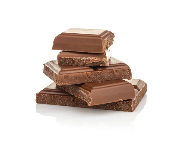 Broken chocolate pieces on white background — Stock Photo, Image