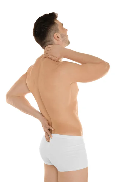 Young man suffering from back pain — Stock Photo, Image