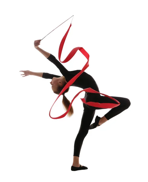 Młoda dziewczyna robi gimnastyka z wstążki — Zdjęcie stockowe