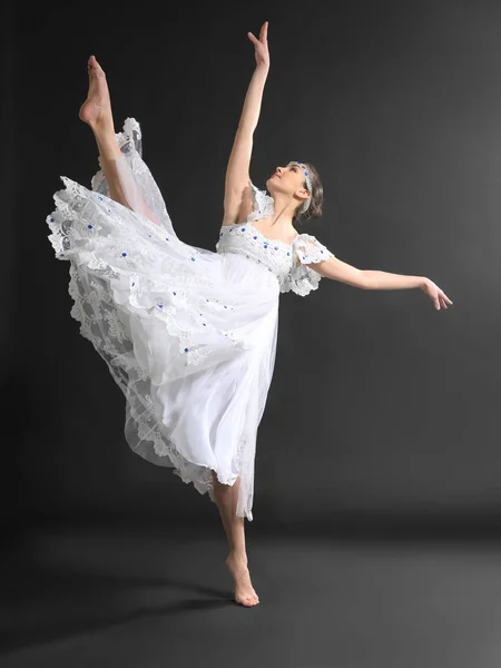 Young beautiful ballerina dancing — Stock Photo, Image