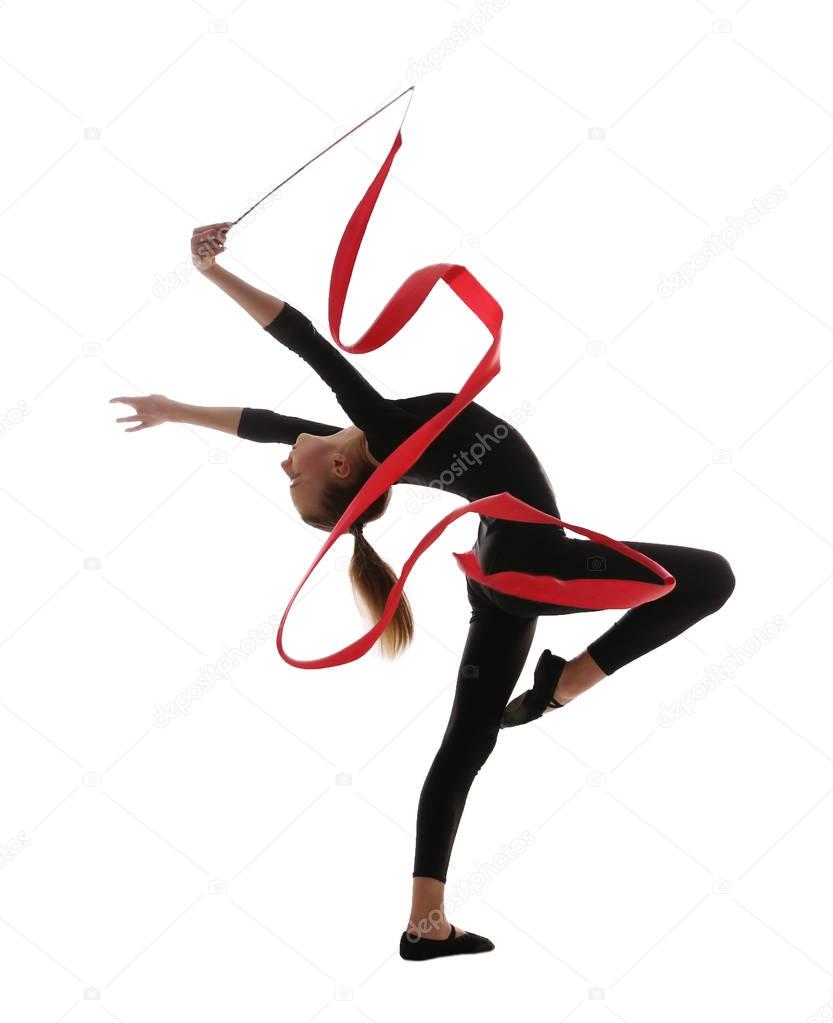 Young girl doing gymnastics with ribbon