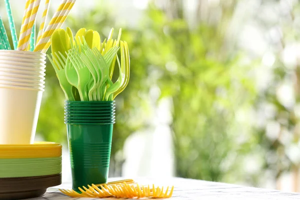 Plastic ware on table — Stock Photo, Image