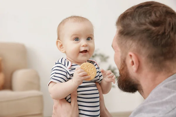 Man playing with cute little baby — Stock Photo, Image