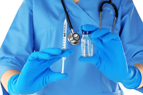 Doctor in gloves with syringe — Stock Photo, Image