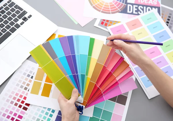 Designer choosing color of interior — Stock Photo, Image
