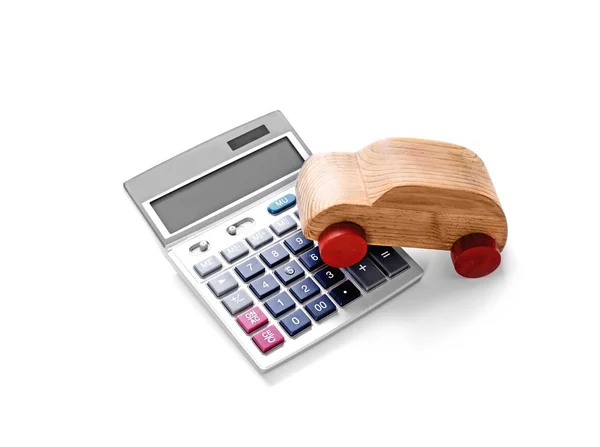 Wooden toy car and calculator — Stock Photo, Image