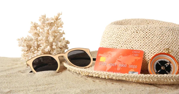 Sand with credit card and hat — Stock Photo, Image