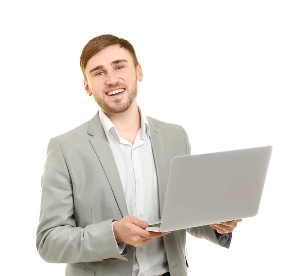 Schöner junger Mann mit Laptop — Stockfoto