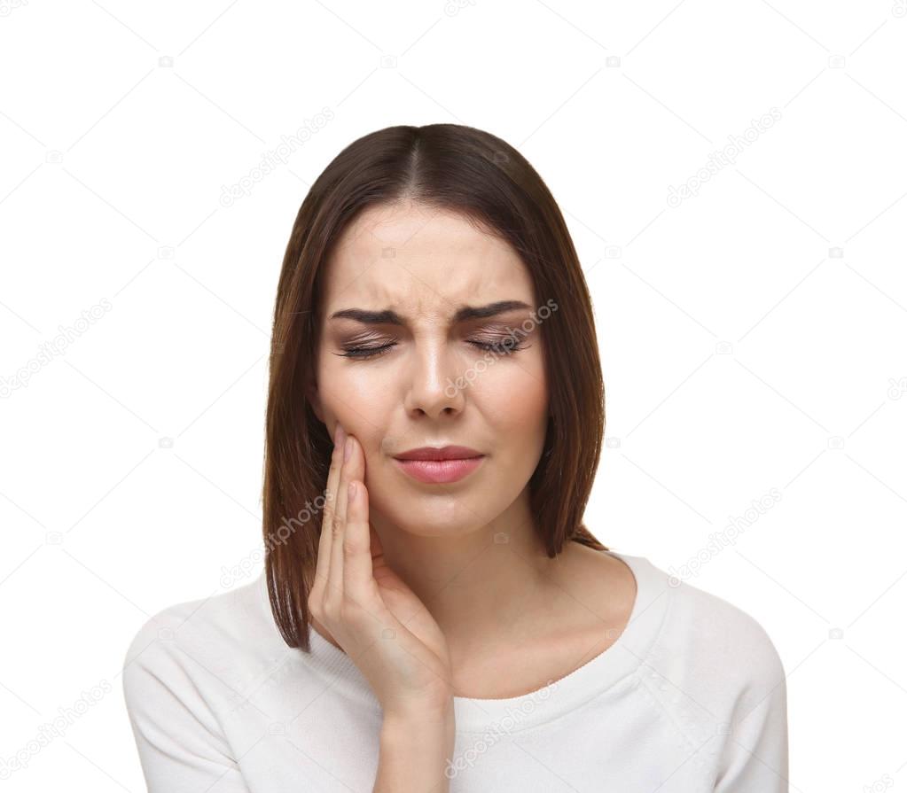 young woman suffering from toothache 