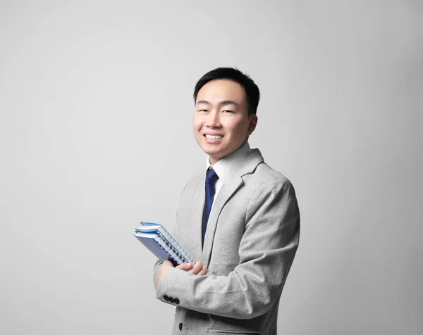 Handsome Asian teacher — Stock Photo, Image