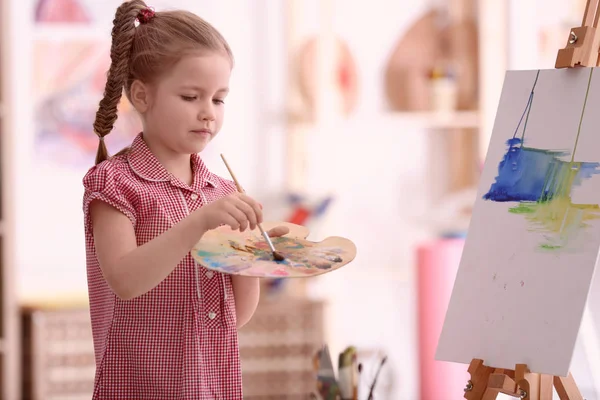 Cute little artist painting picture — Stock Photo, Image