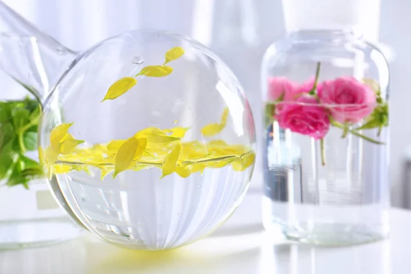 Glassware with perfume essence — Stock Photo, Image