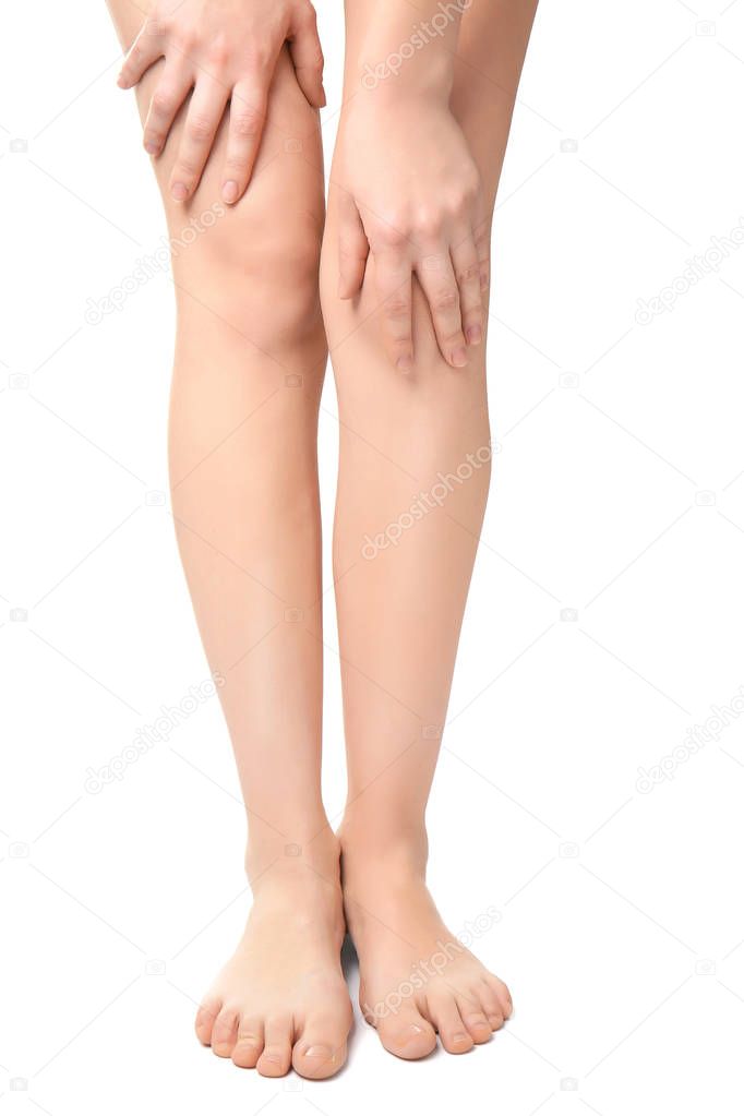 woman suffering from pain in knees