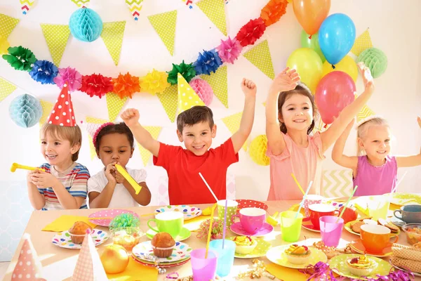 Cute little children celebrating birthday at party — Stock Photo, Image