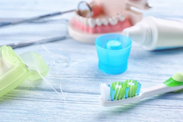 Toothbrush and dental floss — Stock Photo, Image