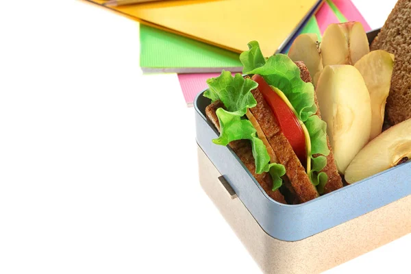 Boîte à lunch avec nourriture et papeterie — Photo