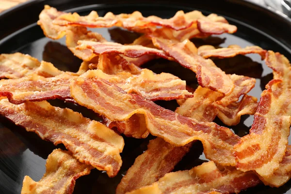 Fatias de bacon saborosas — Fotografia de Stock