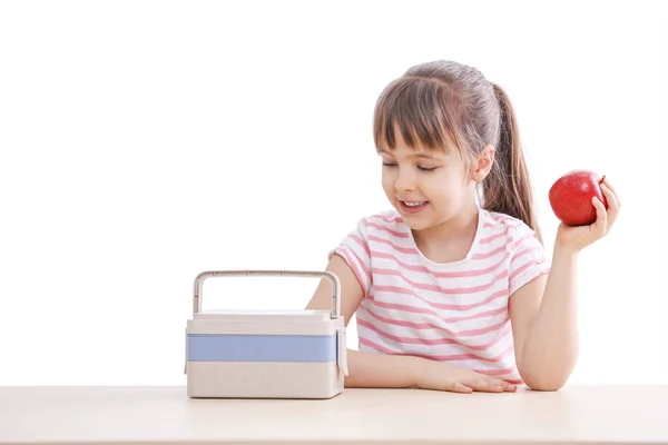 Happy schoolgirl with lunch box — Stock Photo, Image