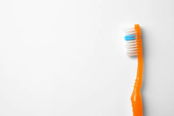 Nova escova de dentes de plástico — Fotografia de Stock