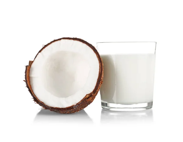 Glass of coconut milk with nut — Stock Photo, Image