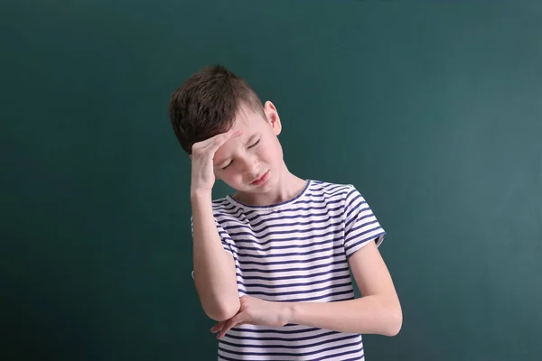 boy suffering from headache