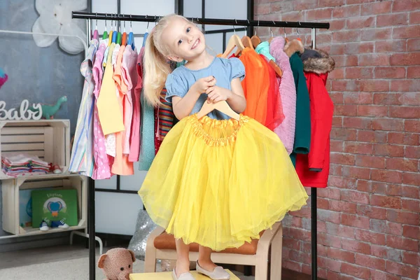 Cute girl in dressing room — Stock Photo, Image