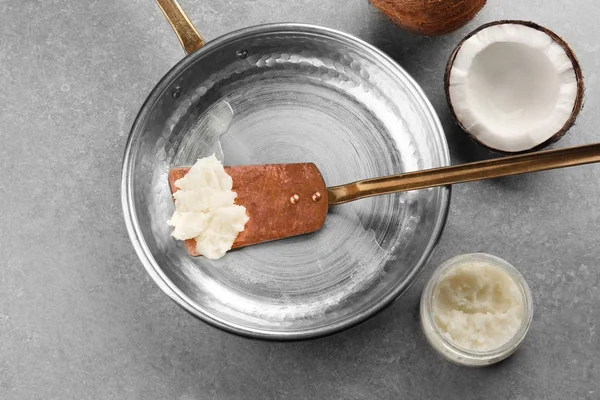 Coconut oil in frying pan — Stock Photo, Image