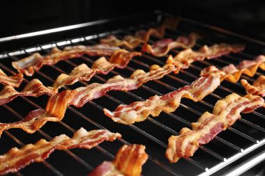 Tasty strips of bacon  clipart