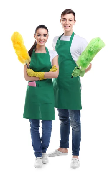 Service team with cleaning tools on white background — Stock Photo, Image