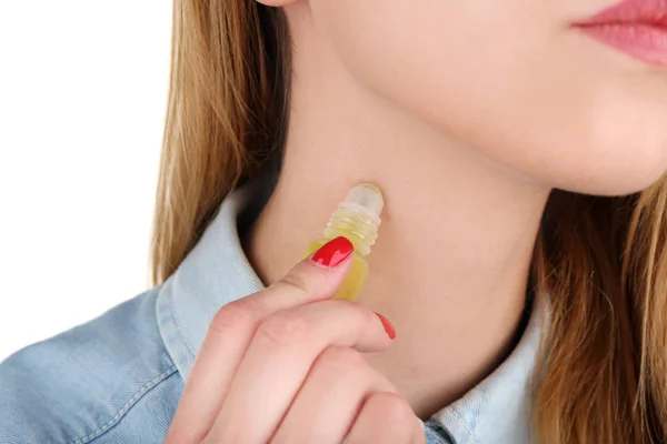 Young woman with bottle of perfume — Stock Photo, Image