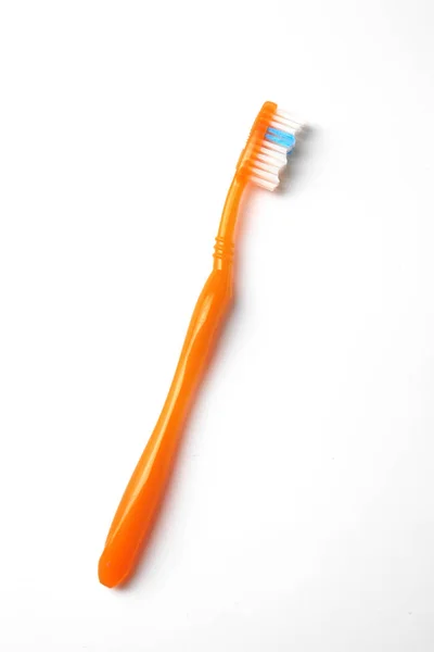 Ny plast tandbørste - Stock-foto