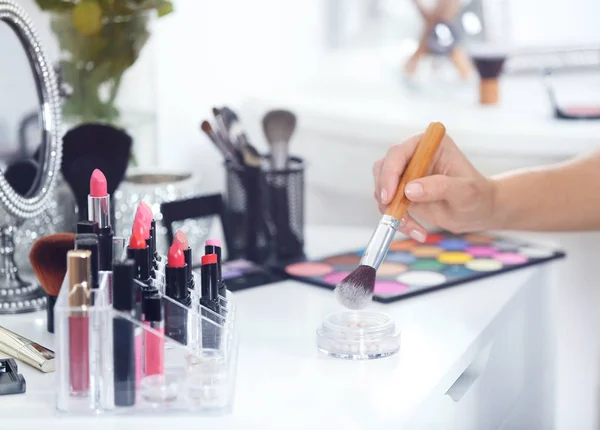 Professional makeup artist with cosmetics — Stock Photo, Image