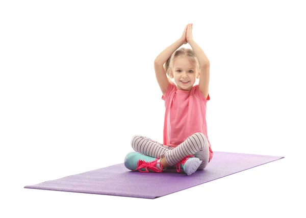 Menina bonito fazendo exercícios de ginástica — Fotografia de Stock