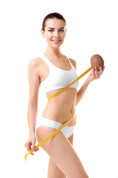 Young woman with measuring tape — Stock Photo, Image