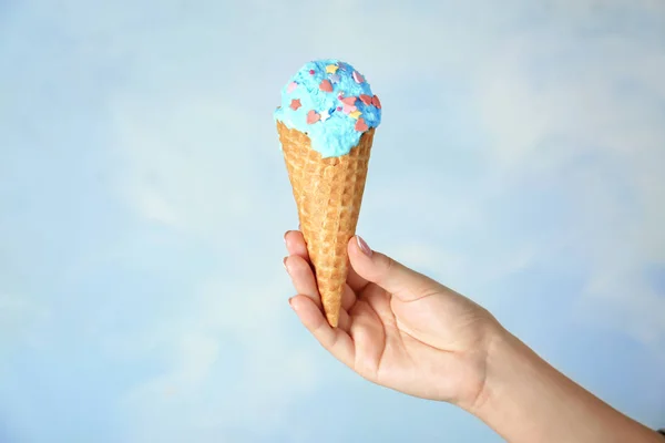 Hand holding ice-cream cone — Stock Image Hand holding ice-cream cone Stock Picture