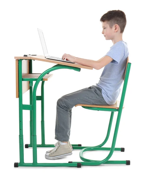 Schoolboy sitting at desk — Stock Image Schoolboy sitting at desk Royalty Free Stock Images