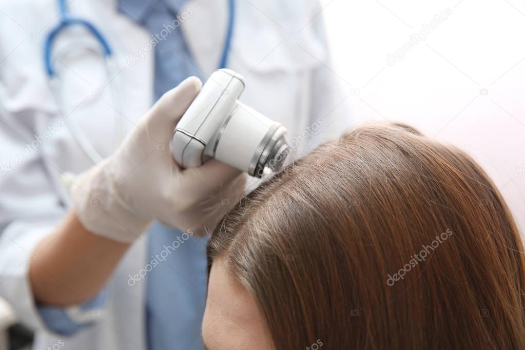 Woman visiting dermatologist