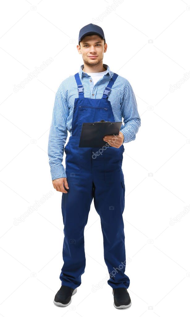 Young plumber in uniform holding clipboard