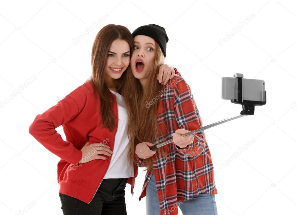 Happy young women taking selfie