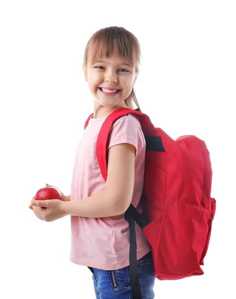 Lycklig skolflicka med ryggsäck och äpple — Stockfoto
