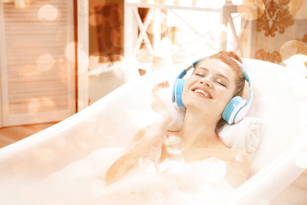 attractive woman relaxing in bath