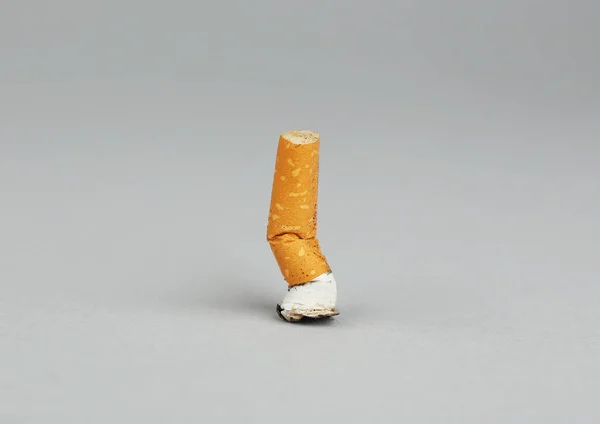 Cigarrillo quemado trasero — Foto de Stock