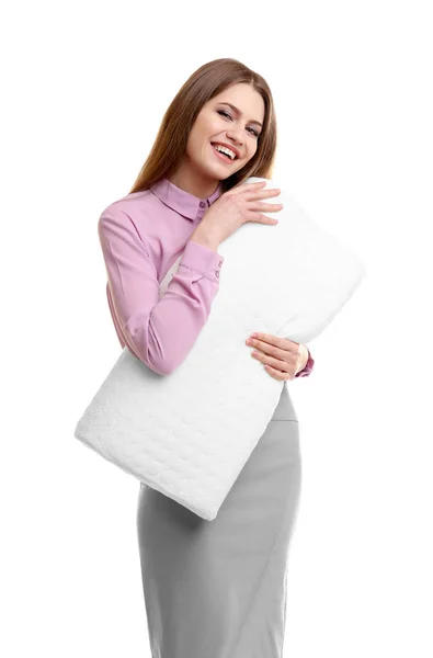 Молодая женщина держит ортопедическую подушку — стоковое фото