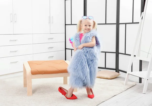 Cute girl in wardrobe — Stock Photo, Image